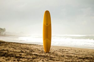 Waxing a surfboard